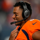 Denver Broncos quarterback Russell Wilson makes a call during the second half of an NFL preseason football game against the Minnesota Vikings, Saturday, Aug. 27, 2022, in Denver.